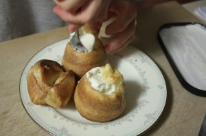 Filling the popovers with ice cream