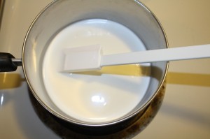 cream heating in a sauce pan