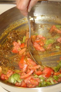 tomatoes and spices sauteing