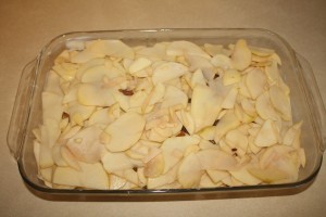 potatoes and mushrooms layered in a baking dish