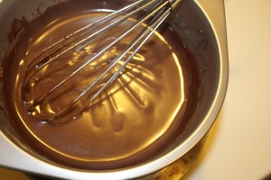 chocolate pudding and a whisk