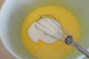Whisk in that vanilla sugar. Make sure to smell the sugar (or even taste it) befoe you mix it in. Yum!