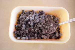 wild blueberries in flour