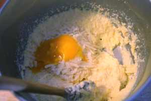 adding egg and cheese