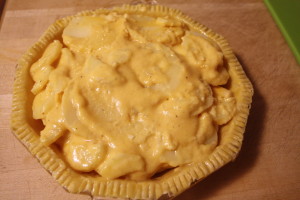 filling a potato pie