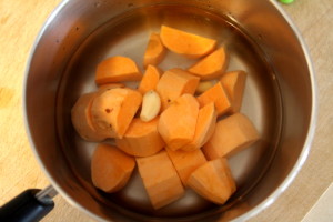 cooking sweet potatoes and garlic