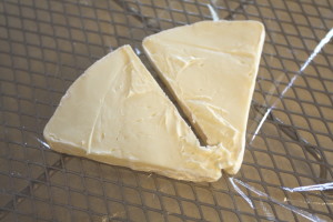 wedge of Brie slice in half