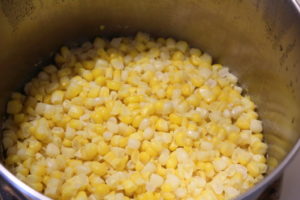 steaming corn