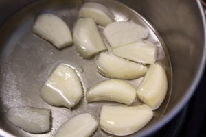 making garlic confit