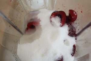 bleding cherries and sugar