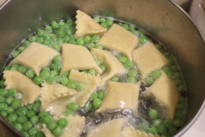 cooking fagoletti and peas
