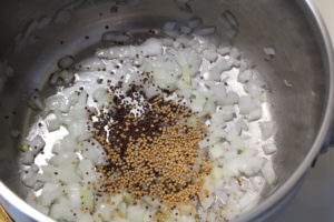 cooking onions and mustard seeds